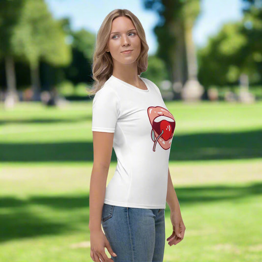 White t-shirt featuring a bold stylized lips and cherry graphic in red, paired with blue jeans—playful, stylish, and perfect for casual wear.
