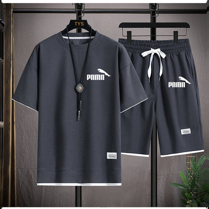 Dark grey breathable fabric with textured grid-like weave, showcasing quick-drying technology and eco-friendly production—perfect for activewear and performance clothing.