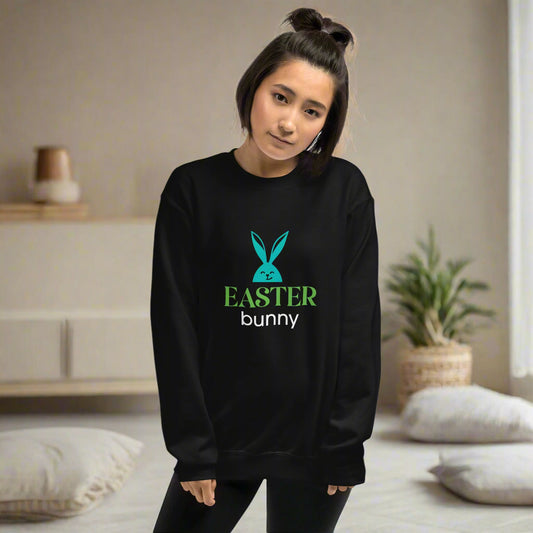 Black sweatshirt featuring a turquoise bunny head graphic with bold ‘EASTER bunny’ text—festive, stylish, and available in six colors excluding white.